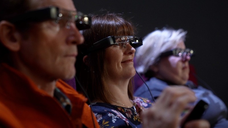 People watching cinema with new technology