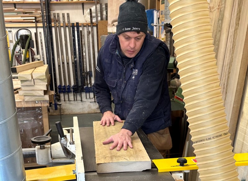 Robert Stone working at joinery